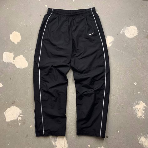 Nike Nike y2k Nylon Drill track Pants | Grailed Nike Trackpants Y2k, Y2k Nike Track Pants Men, Nike Y2k Pants, Nike Track Pants Vintage, Nike Parachute Pants Outfit, Nike Pants Aesthetic, Nike Track Pants Outfits Men, Nylon Pants Outfit Men, Old Nike Pants