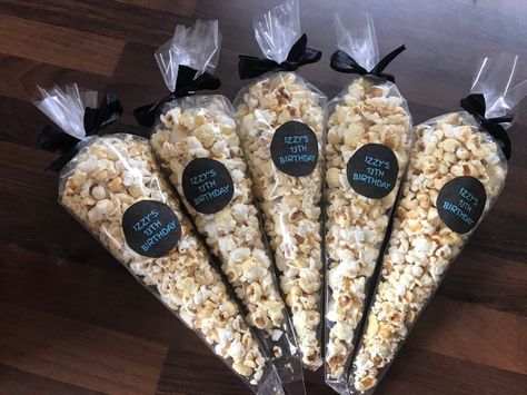 Sleepover popcorn cones with a personalised sticker on each cone.  You will receive six popcorn cone with a black ribbon on each cone finished with an personalised sticker .  Popcorn is sweet can be changed to salted if required. This listing is for six popcorn cones  All popcorn cones are made to order from our approved kitchen.  If you require more popcorn cones or less just get in touch . Ingredients used  Sweet popcorn Wednesday Treat Table, Party Treat Table Ideas, Popcorn Party Favors, Popcorn Cones, Popcorn Decorations, Wednesday Party, Graduation Candy Buffet, Popcorn Wedding, Wedding Snacks