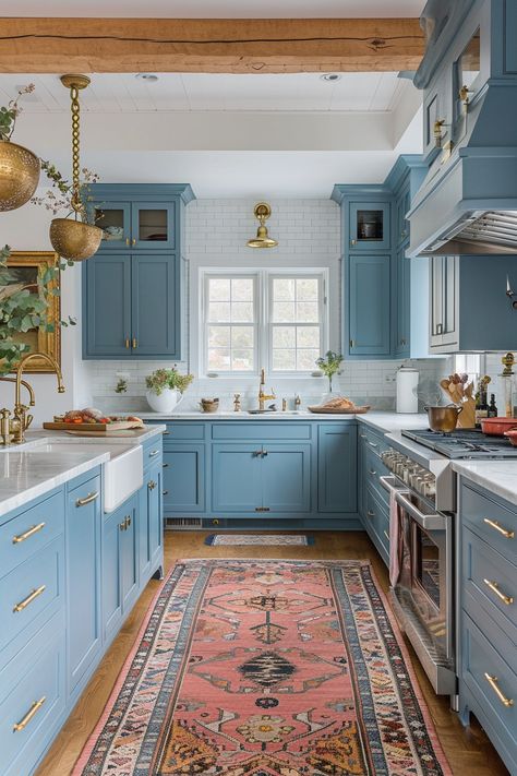 Vintage Blue Kitchen Charm | Powder blue shaker cabinets with brass hardware • Classic subway tile backsplash • Rustic exposed wooden beams • Elegant gold pendant lighting • White farmhouse sink with vintage-style faucet • Ornate patterned runner rug in warm tones • Butcher block countertops enhancing the quaint cottage feel. Blue Aesthetic Home Decor, Blue Cabinets With Butcher Block, Rustic Kitchen Blue, Blue Aesthetic Home, White And Blue Kitchen, Blue Shaker Cabinets, Two Toned Kitchen Cabinets, Kitschy Kitchen Decor, Blue Kitchen Designs