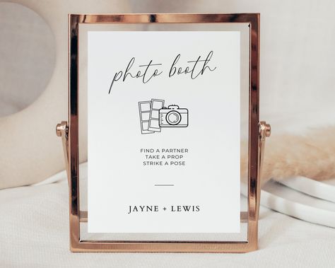 Create lasting memories with our Photo Booth Sign Template. This DIY printable sign adds a touch of modern elegance to your wedding reception. Guide your guests to the fun and capture precious moments with this minimalist signage. * Access your template instantly. * Customize easily with Canva, a free browser program. * Edit wording, colors, and layout with just a few clicks. * Print at home or choose professional printing. YOU'LL RECEIVE ------------------------------------------- ✓ 5 x 7 inch editable Canva template. ✓ 8 x 10 inch editable Canva template. ✓ Instruction guides for printing and editing. LET US EDIT FOR YOU ------------------------------------------- We can personalize and edit your template for you! Click here to find out more & add this to your order: https://etsy.me/3Qtq Photo Booth Signs Wedding, Photo Booth Station, Camera Wedding, Wedding Reception Signage, Polaroid Wedding, Photo Guest Book Wedding, Instax Mini 9, Reception Signage, Diy Wedding Reception