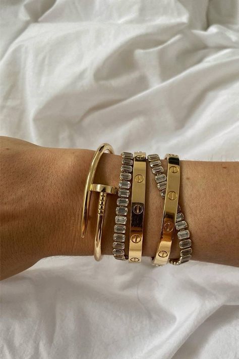 The 7 Most Popular Designer Bracelets Ever | Who What Wear Tiffany T, Statement Jewellery, Classy Jewelry, Cartier Love Bracelet, Jewelry Inspo, Love Bracelets, Jewelry Lover, Bracelet Stack, Bling Bling