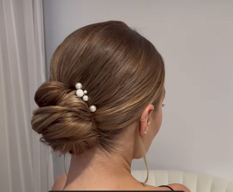 Sleek Mid Bun Wedding Hair, Bride Low Bun With Hair Piece, Slicked Back Low Bun Wedding, Sleek Bun With Pearls, Mid Bun Bridal Hair, Sophisticated Bridal Hair, Wedding Bun With Pearls, Bridal Slick Bun, Modern Bridal Updo