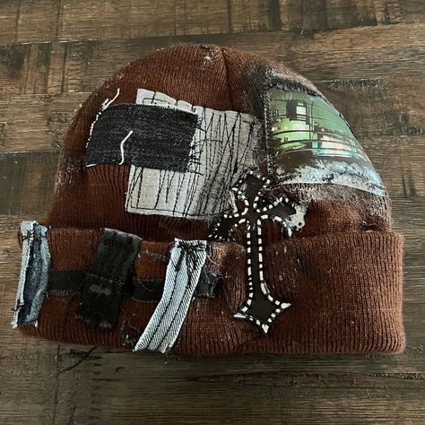 🌐TRIPLE3RD🌐 •+AngelicTimes+• {SOLD} Custom Upcycled 1/1 Beanie Best for a smaller head size. Mend style scrap patchwork all over this hat with graphic patches from: Fallen Angels, our new logo, & a 35mm snapshot I took. Metallic & black paint detailing. Dual gunmetal studs fixed on logo patch. “Lighter” pocket sewn to front. Handstitched cross at back. Handmade tag🏷️ All orders come with stickers and care instructions! Tag me if you take any pics❤️‍🔥 Dm to tap into custom work🫡 ___________... Alternative Fashion Diy, Scrap Patchwork, Drip Fits, Funky Hats, Couple Fits, Fallen Angels, Hat Types, On Logo, Diy Hat