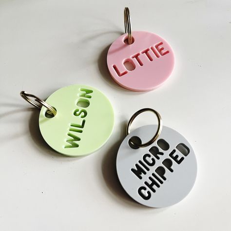 A lovely, personalised tag for your most special pet in a range of gloss or matte colours.  Each tag measures either 1 inch or 1.5 inches and is made from high quality 3mm acrylic. The letters are cut out with a laser machine so please bear this in mind and refer to the attached photo for examples of what the letters look like when they have been cut. The tag is very small and so is designed only to fit either a name or a phone number on, not both. Tag Book, Tag Name, Pet Name Tags, Pet Tags Personalized, Pet Name, Id Tags, Small Pet, Make Happy, Creative Packaging Design