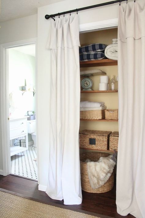 9 Ways to Hang Curtains You Haven’t Thought of Before - Curtains Up Blog | Kwik-Hang Hall Closet Without Doors, Laundry Closet Doors Alternative, Curtains Over Closet, Laundry Room Curtain Ideas, Door Replacement Ideas, Closets Without Doors Ideas, Closet Door Alternative, Curtain Closet, Casa Rock