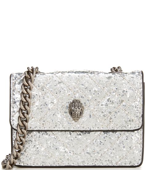 From Kurt Geiger London, the Micro Metallic Sequin Crossbody Bag features:Polyester/PVC/PETPolyester liningOne interior compartmentAntique silver hardwareSnap closureApprox. 4.33'' W x 2.76'' H x 0.98'' D; strap drop 23.62"Imported. Silver Kurt Geiger Bag, Kurt Geiger Bag Mini, Mini Kurt Geiger Bag, Kurt Geiger Micro Bag, Micro Kurt Geiger, Micro Kensington Bag, Kurt Bag, Kurt Geiger Bag, Silver Crossbody Bag