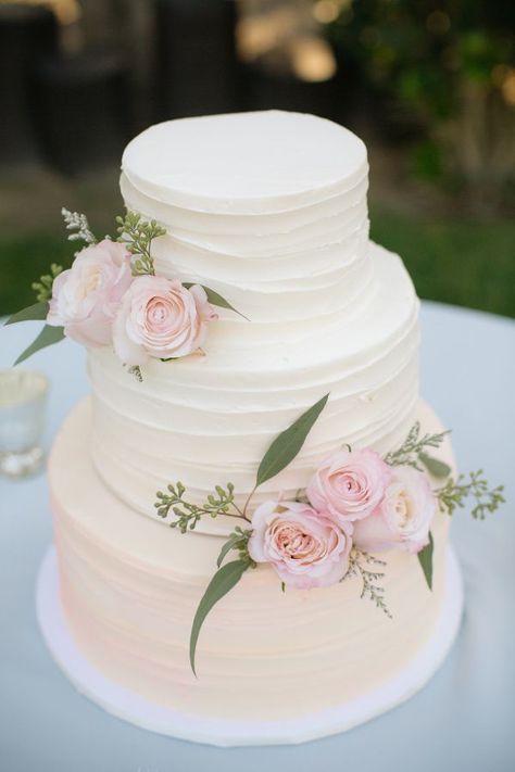 Classic pink floral topped cake: http://www.stylemepretty.com/california-weddings/ramona-california/2016/04/13/rustic-pastel-wedding-with-gorgeous-soft-pink-florals/ | Photography: heidi-o-photo - http://heidiophoto.com/ Wedding Cake Tops, Rustic Wedding Decorations, Wedding Cake Rustic, Simple Wedding Cake, Cake Trends, White Wedding Cake, Elegant Wedding Cakes, Wedding Cake Inspiration, Pastel Wedding