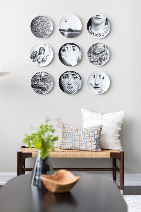 Fornasetti Wall Plates, Plate Wall Decor Modern, Wall Plates Decor Living Rooms, Fornasetti Plates On Wall, Wall Plates Decor, Fornasetti Plates, Plate Wall Display, Plates Wall Decor, Modern Ceramics Design