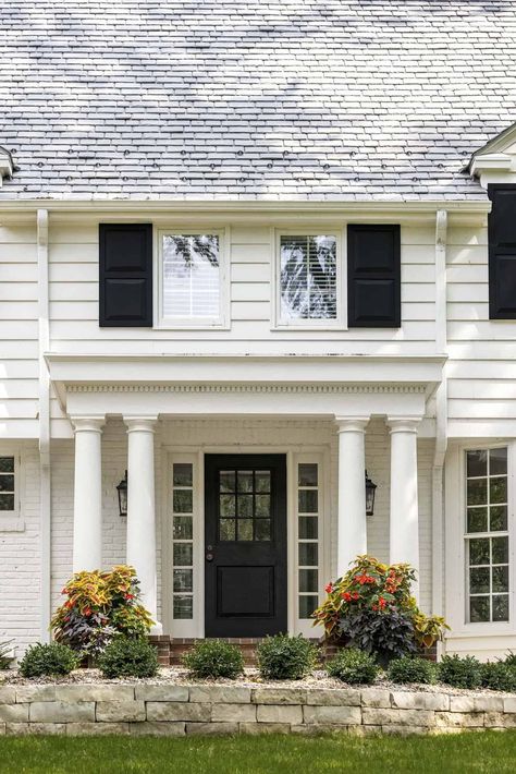 A colonial style home in Minnesota gets a beautifully inspiring facelift Colonial House Style, Updated Colonial Exterior, White Colonial Exterior, Garrison Colonial Exterior, Colonial Entryway, Modern Colonial Exterior, Colonial Front Porch, Modern Colonial Style, Green Neighborhood