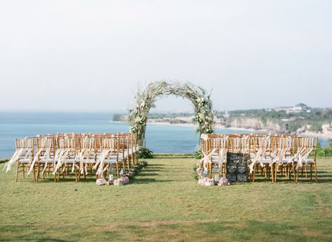 Romantic Cliff Top Wedding by the Sea in Bali: http://www.stylemepretty.com/2014/09/11/romantic-cliff-top-wedding-by-the-sea-in-bali/ | Photography: Jemma Keech - http://jemmakeech.com/ Archway Photography, Cliff Wedding Ceremony, Spring Ceremony, Wanaka Wedding, Montauk Wedding, Aisle Ideas, Ceremony Styling, Wedding Sides, Cliff Wedding