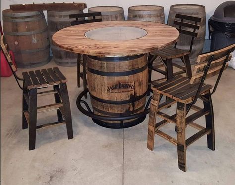 "*JACK DANIEL'S is a registered trademark and is not involved in or affiliated with the production or distribution of this product. FREE Shipping is available ANYWHERE in the 48 states. Entire set ships on a private furniture carrier that blanket wraps everything and delivers right to your home! Whiskey Barrel table with Footrest, 48\" Burnt Hickory Top and 4 chairs made entirely of barrel staves. Barrel is branded as seen in photos. Very sturdy set that will be the talk of any party or family g Whiskey Barrel Table Top, Patio Table Redo, Bourbon Barrel Table, Jack Daniels Barrel, Rustic Patio Furniture, Whiskey Barrel Bar, Whiskey Barrel Table, Wine Barrel Bar, Jack Daniels Whiskey Barrel