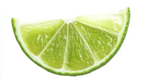 ↑↑↑ Larger size on website 🔸 A lime wedge, sliced in half, is shown against a white background.  The wedge is green and juicy, wi Shiny Texture, Lime Wedge, White Background, Wedges, Texture, Green, White