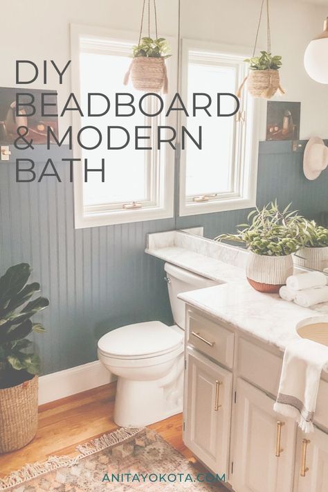 DIY Beadboard Wall and Modern Bathroom Renovation | Anita Yokota | We recently refinished a guest bathroom by painting dated white beadboard and wallpaper with a fresh coat of a modern blue paint. Finished with a modern rug, this DIY bathroom remodel is both modern but comfortable! #bathroom #DIY Beadboard Walls Bathroom, Blue Beadboard Bathroom, Painted Beadboard Bathroom, Diy Bathroom Accent Wall, Bathroom With Beadboard Walls, Painted Beadboard Walls, Diy Beadboard Walls, Beadboard And Wallpaper, Beadboard Diy