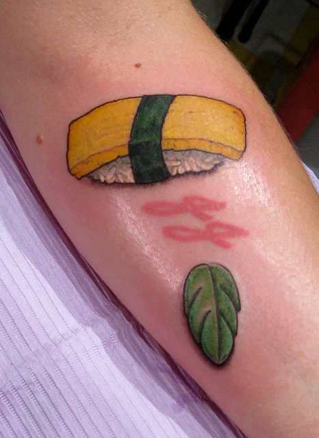 Tamago sushi Wasabi Tattoo, Sushi Tattoo, Tamago Sushi, Culinary Tattoos, Sushi Dessert, Nerdy Tattoos, Food Tattoos, Tattoo Ink, Get A Tattoo