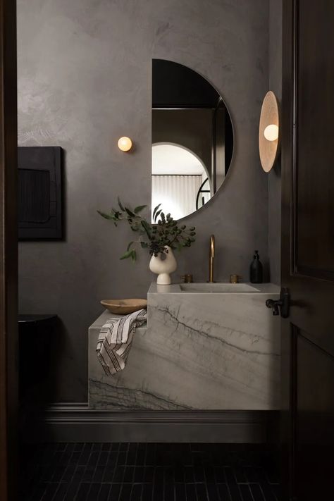 21 Modern Bathroom Ideas That Will Convince You to Go Sleek | Architectural Digest Modern Spa Bathroom Design, Sleek Bathroom Ideas, Black Bathroom Vanity Mirror, Contemporary Primary Bathroom, Moody Organic Modern Bathroom, Modern Sleek Bathroom, Powder Room Without Window, Luxury Classic Bathroom, Dark Powder Room Ideas