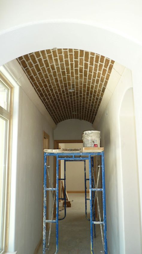 brick barrel-vaulted ceiling.  Our klompie colouring is more terracotta, but would look just as awesome against the white walls Brick Vaulted Ceiling, Brick Ceiling, Porch Renovation, Master Remodel, Wellbeing Centre, Bar Nook, Architectural Detailing, Barrel Vault Ceiling, Barrel Ceiling