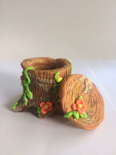 This handmade polymer clay Tree stump box, jewelry box, woodland box, peach flowers and green vines, perfect perch for a gnome or fairy, multicolored  Browns, not a toy, hold rings, and earring holder, secret container., one of a kind, fantasy, mint greens, all handmade, miniature art, collectible,fun my own creation.can hang anywhere not just on a Christmas tree.  One of a kind no molds or painting done on figurine she is cooked in the oven.  A final light coat glaze is used to give bit of shin Cute Clay Containers, Fairy Clay Ideas, Fairy Clay Art, Jewelry Box Clay, Clay Trinket Box Diy, Polymer Clay Cottagecore, Clay Tree Stump, Clay Earring Holder, Clay Box Ideas