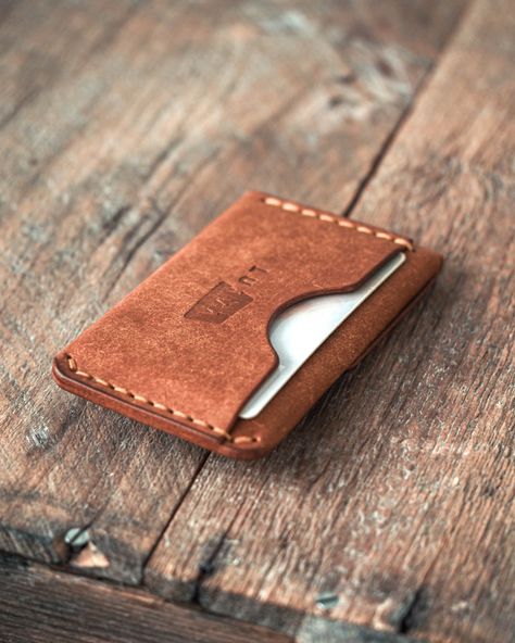 Handmade leather wallet in a compact yet convenient form. Snap button shields your possessions so you can carry on without a worry in your mind. The core pocket of the Messenger wallet can take up to 7 cards - or 5 if you carry coins in it. In front of the core pocket there's a cut pocket that suits double folded cash. On the back is a slot for your most frequently used card for quicker access. All in all this so called "wrap wallet" is small enough for you to carry on your front pocket. Messeng Wrap Wallet, Minimalist Leather Wallet, Kids Garments, Wallet Minimalist, Handcrafted Bags, The Messenger, Handmade Leather Wallet, Shoe Inspiration, Green Cards