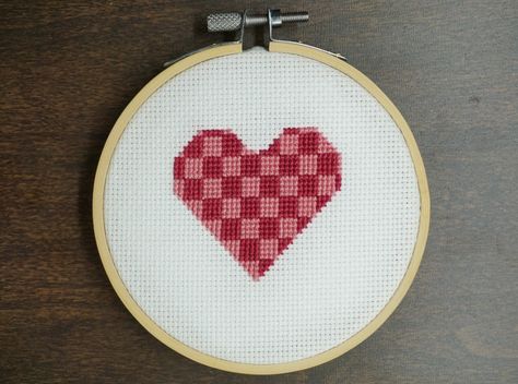 The Pink Checkered Heart Cross Stitch Pattern Download is an excellent project to do for Valentine's Day!  This can be used as an activity for a beginning stitcher, a gift for a loved one to bring some joy or maybe just for yourself to have a little fun. This listing is for PDFs of this pattern and not a completed piece of work or a kit. The charts are Instant Download so you can start stitching straight away! The PDF Pattern Includes:  - Only a Pattern in color with symbols  - A floss legend wi Cross Stitch Heart Pattern, Pink Cross Stitch, Heart Cross Stitch Pattern, Heart Cross Stitch, Red Cross Stitch, Easy Cross Stitch Patterns, Pink Checkered, Cross Stitch Love, Cross Stitch Heart