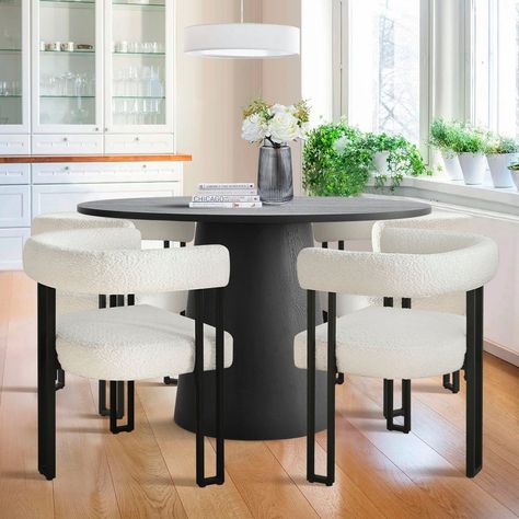 Introducing the black round pedestal dining table set, a stunning addition to any dining space. Crafted with the utmost attention to detail, this exquisite 5-piece set combines timeless elegance with durability to withstand the test of time.The centerpiece of this set is the black round dining table, measuring 46" x 46", or 35"x35". Its sturdy construction ensures stability, while the classic design adds a touch of sophistication to your dining area. The round shape allows for easy conversation and creates a warm and inviting atmosphere for your guests.Accommodating a party of 4 or 2 this set provides ample room for each guest to dine comfortably. The pedestal structure not only adds visual appeal but also creates an open and airy ambiance. With plenty of leg space, everyone seated around Modern Round Dining Table Set, Black Round Dining Table, Modern Round Dining Table, Round Dining Table Set, Blue Velvet Dining Chairs, Round Dining Table Modern, Round Pedestal Dining, Round Pedestal Dining Table, Dining Chairs Set Of 4