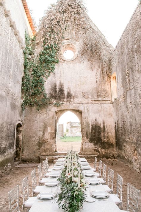 A sun-kissed vineyard ceremony, intimate wedding dinner inside romantic stone ruins, bas relief cake and modern, yet elegant bridal separates are just a few of the noteworthy details from this Portugal elopement with classic cream and blush blooms. Paired with hand-painted invitations, mother of pearl flatware and lucite dining chairs, and you have yourself some major reasons for considering a microwedding at a historic European venue. Wink wink! Bridal Boho Flowers, Ruins Wedding Decor, Ruin Wedding Venues, Ruins Wedding Venues, Castle Ruin Wedding, Wedding In Ruins, Portugal Destination Wedding, Historic Wedding Venues, Castle Ruins Wedding