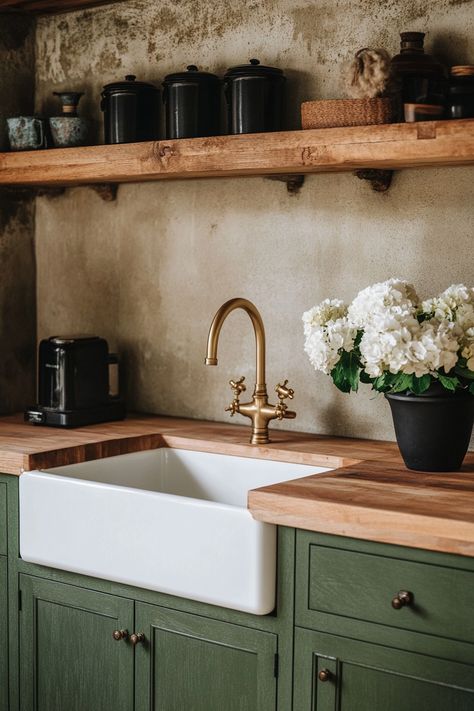 Discover the latest kitchen design featuring rustic wooden countertops, elegant brass fixtures, and open shelving. This beautiful setup combines functionality with classic aesthetics. Perfect for those seeking a cozy and stylish kitchen update. 🌿🏡 #KitchenDesign #HomeDecor #RusticCharm Kitchen Wooden Countertops, Wooden Kitchen Countertops, 60s Ranch, Rustic Kitchen Countertops, Wooden Countertops Kitchen, Classic English Kitchen, Earthy Kitchen, Timeless Kitchen Design, Wood Countertops Kitchen