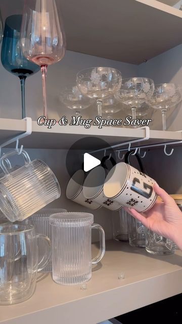 1.7K views · 114 comments | Jenna Crandall on Instagram: "These Mug space savers I can stand behind. These really make a huge difference in cabinets! I also linked all my favorite Amazon cups, mugs and must haves. ✨Comment LINKS ✨ 

Follow my shop @Jenna_Crandall on the @shop.LTK app to shop this post and get my exclusive app-only content!
https://liketk.it/4ARw2 #amazon #amazonmusthaves #kitchenorganization #kitchendecor #kitcheninspiration #homesweethome #homehacks #organization #organized #cups #kitchencabinets #mugs #mugsofinstagram #coffeecup #coffeetime #coffeemug #coffeelover" Storage For Drinking Glasses, Mug Organization Cabinet, Coffee Cup Organization, Mug Organization, Cabinets Organization, Space Savers, Home Hacks, Kitchen Inspirations, Kitchen Organization