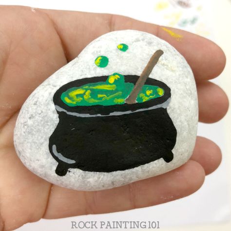 Cauldron Painting Ideas, Spooky Painted Rocks, Rock Painting Step By Step, Halloween Painted Rocks Ideas, Halloween Rock Painting Ideas Easy, Cauldron Painting, Halloween Stones, Halloween Rock Painting Ideas, Halloween Rock Painting