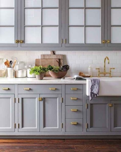 1. Swap out ugly knobs and pulls | 8 Ways To Add Character To Your Bare-Bones Rental Apartment Blue Gray Kitchen Cabinets, Kitchen Cabinets Color Combination, Home Depot Kitchen, Light Grey Kitchens, Kitchen Cabinet Trends, Серая Кухня, Painted Kitchen Cabinets Colors, Farmhouse Kitchen Cabinets, Gray Kitchen