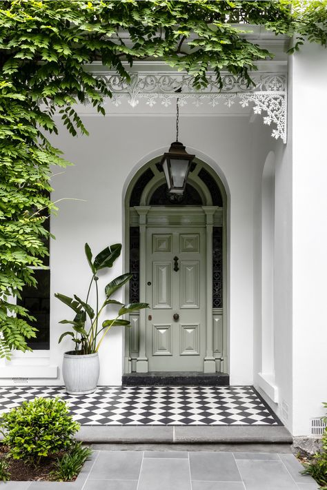 traditional-style home entry with sage green door and black and white checkerboard tiles Kensington Homes Interiors, Villa Front Door, Old Style Homes, English Homes Interiors, Verandah Tiles, English Tiles, Terrace House Exterior, Villa Renovation, White Villa