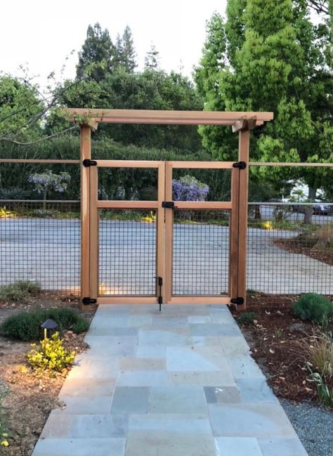 If you have a double gate installed over a concrete or tile walkway, you will likely ask: how do I get the cane bolt to stay in the ground? The easiest way to do it is to drill a simple hole into the concrete, recommended for gate setups where the inactive gate isn't used very often. For frequently-used gates, install a cane bolt that includes a strike plate. This adds a protective layer over the concrete so it doesn't get chipped up. Be sure to have a knowledgeable installer!! Horse Panel Fence, 6ft Fence Ideas, Country Fencing, Cheapest Fence Ideas, Aesthetic Fence, Fence Gate Ideas, Simple Fence, Garden Fence Gate, Yard Fencing