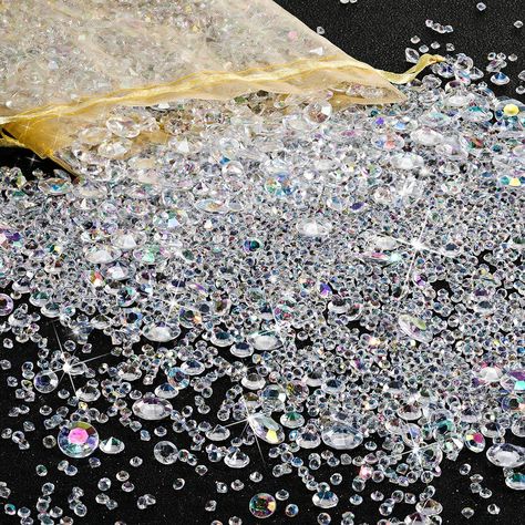 PRICES MAY VARY. Sufficient quantity and size: You will get 7000 pieces of acrylic diamonds, enough for you to decorate.These pretty acrylic gems are mixed in 4 different sizes, 3 mm/ 0.12 inch, 4.5mm/0.18 inch,6 mm/ 0.24 inch and 10 mm/ 0.4 inch, various sizes can meet your different decorating needs and will not take up so much space. Beautiful home decorations:These exquisite acrylic diamonds are good for home decorations, suitable for filling up a vase ,making delicate DIY accessories.They a Table Decorations For Wedding, Vase Making, Gold Table Runners, Bling Party, 60 Wedding Anniversary, Denim And Diamonds, Diamond Decorations, Simple Centerpieces, Acrylic Gems