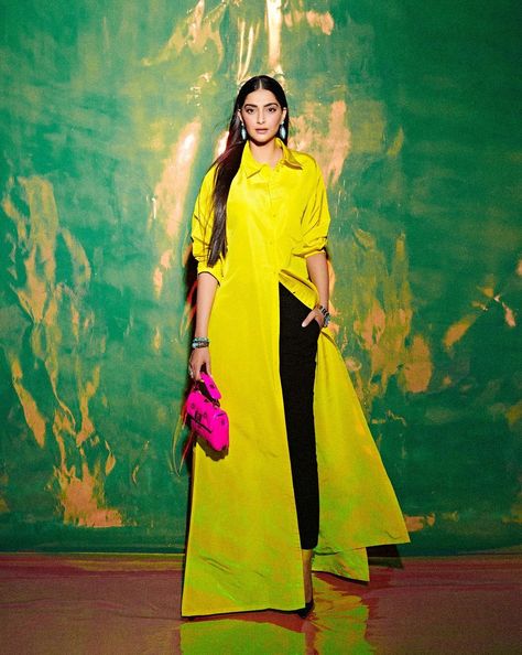 Bollywood actress, Sonam Kapoor is indeed a fashion queen. She is counted amongst some of the most bankable actresses in the industry whose wardrobe collection is a dream for many. From luxurious ensembles and accessories, including bags, shoes, and jewellery, to all other styling elements, Sonam has an array of collections in her wardrobe. Now, recently, as she stunned in a striking yellow shirt dress, she was seen giving tough competition to Hollywood actress, Anna Hathaway.    Sonam K White Pumps Heels, Yellow Shirt Dress, Valentino Shirt, White Pump, Tiny Clothes, Beautiful Pakistani Dresses, Yellow Shirt, Celebrity Moms, Sonam Kapoor