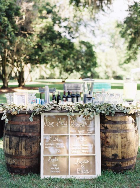 6 Creative Ways to Serve Beer at Your Wedding | TheKnot.com  PS beers from all the places we've lived and traveled. Outdoor Wedding Bar, Wine Barrel Wedding, Wedding Drink Bar, Buffet Wedding Reception, Wedding Drink Station, Reception Bar, Barrel Decor, Wedding Ceremony Ideas, Rustic Outdoor Wedding