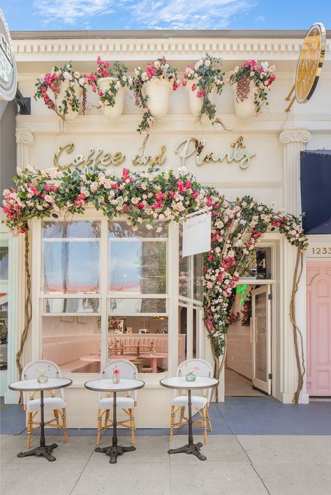 Flower Shop Outside Design, Bakery Photo Op Wall, Classy Bakery Interior, Floral Bakery Interior, Paris Cafe Exterior, Flowers Store Design, Victorian Cafe Exterior, Flower And Cafe Shop, Flower Coffee Shop Design