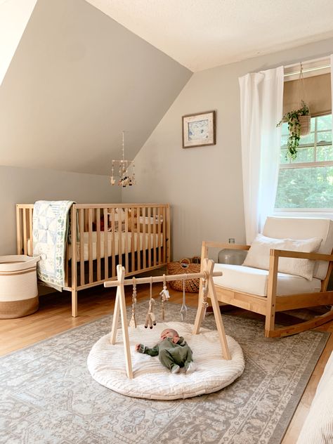 Scandi Style Nursery, Serene Nursery Gender Neutral, Nursery With Vaulted Ceiling, Simplistic Nursery Gender Neutral, Neutral Changing Table, Simple White Nursery, Calming Baby Nursery, Nursery Ideas Slanted Ceilings, Neutral Minimal Nursery