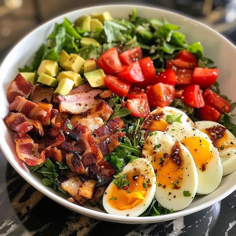 🥗🥓 Dive into a classic Cobb Salad! Packed with flavor and freshness for any meal. #CobbSalad #HealthyChoice Cobb Salad Recipe This hearty salad is a perfect blend of crisp greens, rich toppings, and a flavorful dressing. Ingredients: Romaine lettuce, chopped: 150g Iceberg lettuce, chopped: 150g Cooked chicken breast, diced: 200g Bacon, cooked and crumbled: 100g Hard-boiled eggs, chopped: 3 eggs Avocado, diced: 100g Cherry tomatoes, halved: 100g Blue cheese, crumbled: 50g Chives, chopped: ... Salad Cobb, Big Salads, Perfect Salad Recipe, Classic Cobb Salad, Cobb Salad Recipe, Eggs Avocado, Different Salads, Healthy Food Menu, Bacon Salad