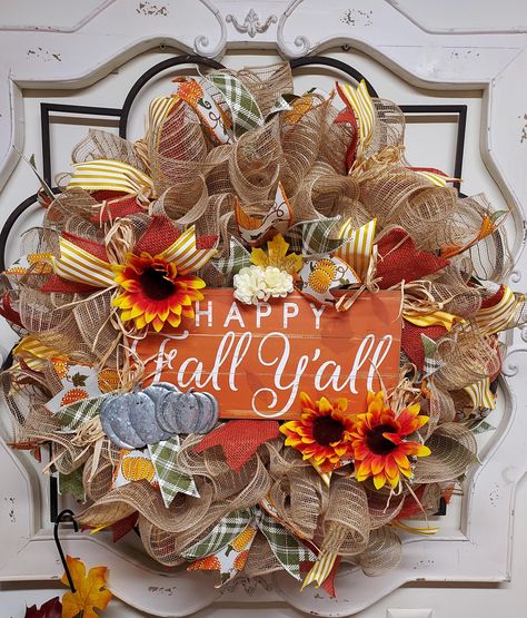 Hey friends wow your friends and neighbors with this beautiful fall wreath on your front door or in your entry way.  The beautiful fall colored premium ribbon added with adorable galvanized metal pumpkin decor and the popular "happy fall ya'll" sign just makes this wreath scream cuteness!  This adorable wreath is a perfect way to welcome fall in to your home or business.  It would even look festive added to your fall decor around your house hanging on a wall or over a mantel!  What a fun and fes Happy Fall Yall Sign, Fall Mesh Wreath, Fall Mesh Wreaths, Holiday Wreaths Diy, Metal Pumpkins, Pumpkin Decor, Wreaths Diy, Autumn Wreath, Welcome Fall