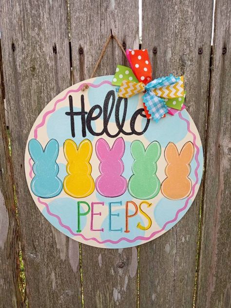 "Y'all check out this adorable Easter peep door hanger. Hand painted on 5 mm thick wood, a 15\" diameter round and varnished for protection. Jute hanger and ribbon accent. This door hanger is very lightweight." Easter Porch Decor, Easter Paintings, Easter Door Hanger, Door Signs Diy, Summer Door Hanger, Craft Decorations, Easter Door, Easter Peeps, Easter Craft