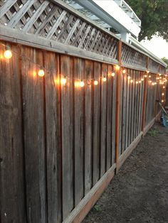 DIY backyard lighting. Hang lights on your fence! Fence Outdoor, Landscape Lighting Design, Patio String Lights, Fence Lighting, Meteor Garden 2018, Backyard Lighting, Fence Decor, Deck Lighting, Backyard Fences