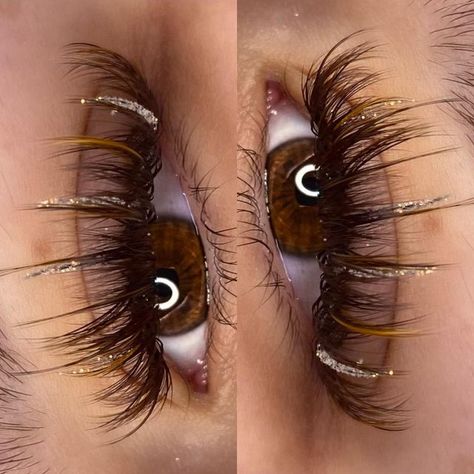 Lash Extensions With Glitter Spikes, Wispy Lash Extensions With Color, New Years Lashes, Gold Glitter Lash Extensions, Volume Lash Extensions With Glitter, Eyelash Extensions Glitter, Lashes Color Eyelashes, Gold Lash Extensions, Wispy Lashes With Color