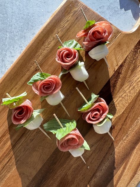 Fairy Party Food Savory, Tea Party Entrees, Garden Party Appetizer Ideas, Rose Themed Party Food, Flower Shaped Snacks, Flowers In Food, Salami Rose Caprese Skewers, Floral Themed Appetizers, Rose Food Ideas