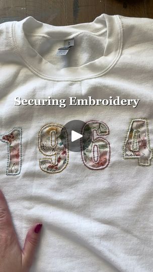 2.3K reactions · 183 shares | How I Secure the Back of My Embroidery on Sweatshirts

Ever wondered how to keep your embroidery neat and secure, especially on clothing? I’m sharing my favorite technique to make sure those stitches stay put and last!

Here’s how I do it:
✔️ First, I apply fusible interfacing to protect the fabric and give extra support.
✔️ Then, I use iron-on hem adhesive for added security.
✔️ Finally, I add a fabric backing and set everything with an iron for a clean, polished finish.

If you want to see the whole tutorial, check out my YouTube for a more in-depth look.

#EmbroideryTips #EmbroideryHacks #HandEmbroidery #EmbroideryProcess #DaisiesAndDukeEmbroidery #DIYEmbroidery #SweatshirtEmbroidery #CraftyTips #SewingHacks #EmbroideryCommunity #StitchingTechniques #sewing How To Protect The Back Of Embroidery, Hand Stitched Sweatshirt Diy, Stitching On Sweatshirt, Reverse Embroidery Sweatshirt, Embroidery Designs For Sweatshirts, Embroidery Hoodie Diy, Embroidery Sweatshirt Diy, Embroidery On Sweatshirts, Embroidered Sweatshirt Diy