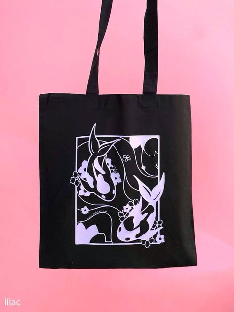 [CommissionsEarned] Koi Fish Are A Symbol Of Good Luck, Courage, And Perseverance In Southeast Asian Culture. A Perfect Token For You! Take This Gorgeous And Calming Koi Pond Design Everywhere You Go With Our Sturdy 100% Cotton Tote Bags. Information: Material: 100% Cotton Thickness: 150Gsm (Thick And Sturdy) Dimensions Of Bag: 23 23 Cm Dimensions Of Handles: 23 X 2.5Cm The Art Is Printed On Durable, High-Quality Vinyl. Colour Of Tote Bags: Black We Also Offer #cooltotebagdesign Black Canvas Bag Painting Ideas, Diy Painted Tote Bag Ideas, Black Tote Bag Painting Ideas, Creative Tote Bag Design Ideas, Black Tote Bag Design Ideas, Black Tote Bag Design, Black Tote Bag Aesthetic, Cool Tote Bag Design, Bag Painting Ideas