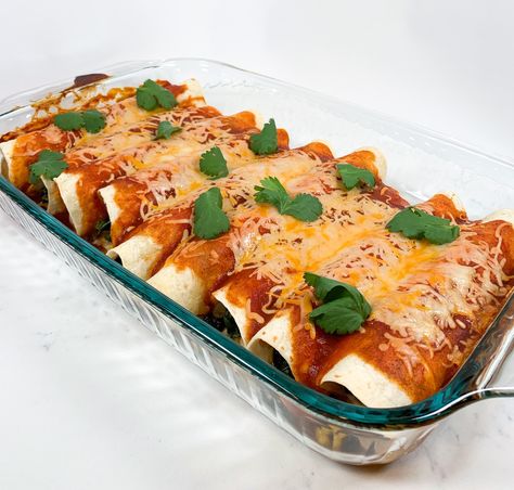 Black Bean and Spinach Enchiladas Spinach Black Bean Enchiladas, Spinach And Black Bean Enchiladas, Potluck Ideas Vegetarian, Make Ahead Healthy Meals, Spinach Enchiladas, Potluck Ideas, Vegetarian Enchiladas, Bean Enchiladas, Mom Edit