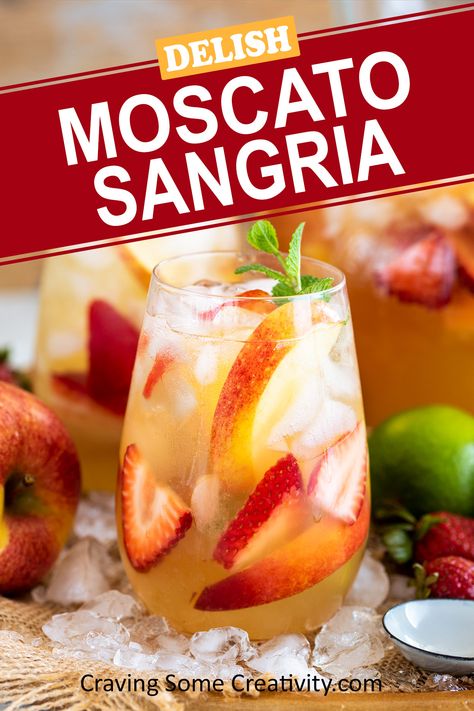 Glass of Moscato sangria with apples and strawberries garnished in it. Red Moscato Sangria, Moscato Peach Sangria, Fall Moscato Sangria, Breakfast Sangria Brunch, Strawberry Sangria Recipes Easy, Moscato Drinks Recipes, Moscato Sangria Recipes Easy, Carmel Apple Sangria Moscato, Sangria With Moscato