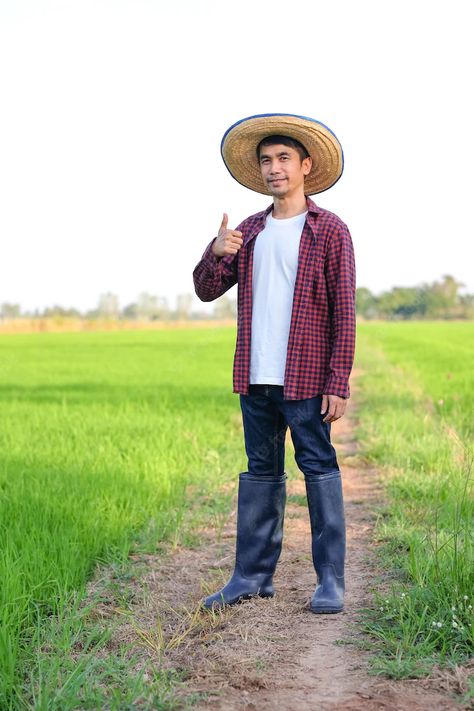 Premium Photo | Asian farmer man smile and thumbs up at green rice farm. Farmer Man, Rice Farm, Tattoos Black Women, Man Smile, Heart Shaped Hands, Poster Flat, Green Rice, Olive Top, Mini Burgers