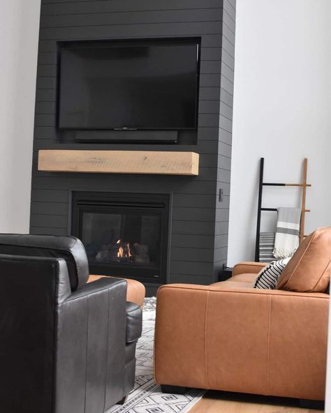 14 Black Shiplap Fireplace To Provide Warmth in Style Black Shiplap Fireplace, Black Fireplace Mantel, Black Fireplace Wall, Black Shiplap, White Mantel, Living Room Plan, Wooden Mantel, Black And White Living Room, Black Fireplace