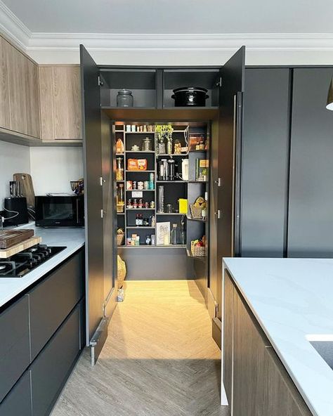 Wren Kitchens on Instagram: "What’s the secret behind a picture-perfect kitchen? It’s what lies behind the scenes! A pantry or chef’s larder is fast becoming one of the home's most desired features in the home. This amazing pantry is stocked to perfection and hidden behind this beautiful run of striking Milano Pencil cabinets. It is the perfect way to neatly store your kitchen essentials. 📸: @houseonthetop #wrenkitchens #wrenovation #kitchendesign #kitcheninspo #kitchendecor #homedecor #kitche Amazing Pantry, Desired Features, Wren Kitchens, Minimal Kitchen Design, Hidden Pantry, Handleless Kitchen, Small Kitchen Layouts, Hidden Kitchen, Storage Idea