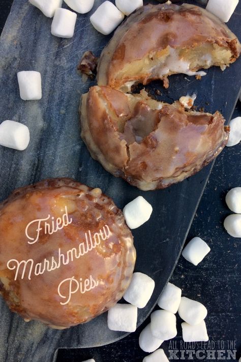 Gooey melted marshmallows are enclosed in this flaky, fried crust and covered in glaze. Marshmallow Pie, Gilmore Girls Coffee, Fried Pies, Hand Pie, Hand Pies, Mini Pies, Fair Food Recipes, Mashed Sweet Potatoes, Easy Delicious Recipes